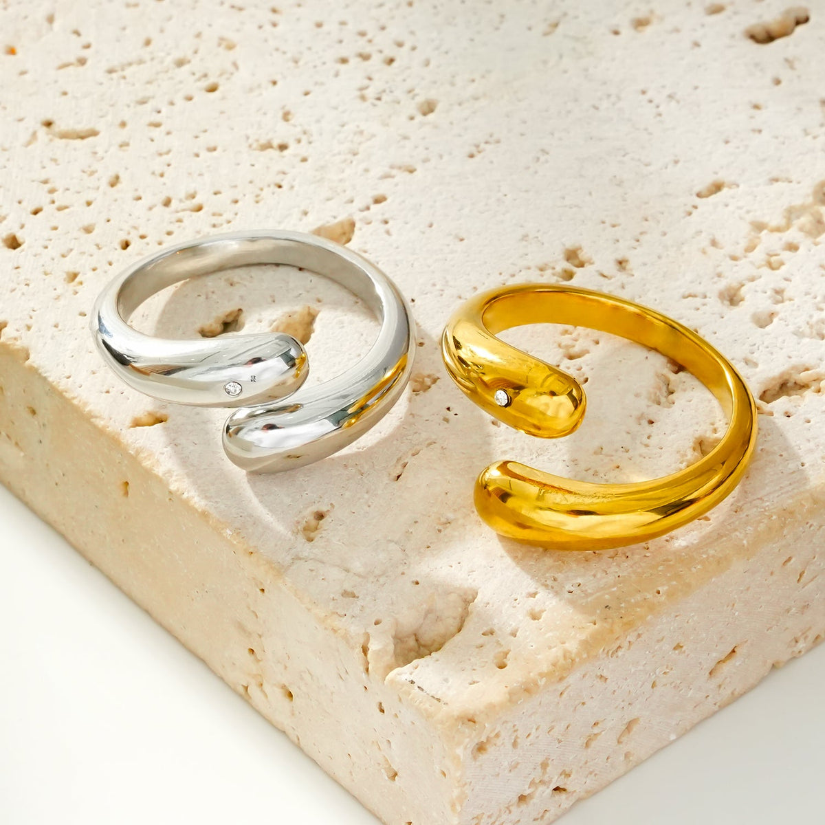 GARUVA: Modern Abstract Ring with Solitaire Zirconia Gemstone in Gold