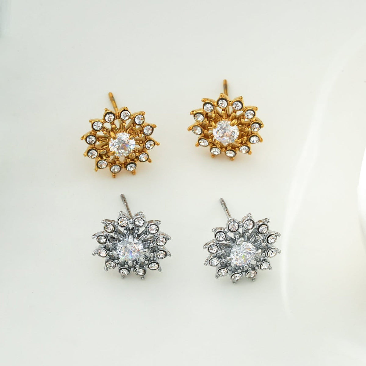 KERELA Gold: Shimmering Star Zirconia (CZ) Stud Earrings