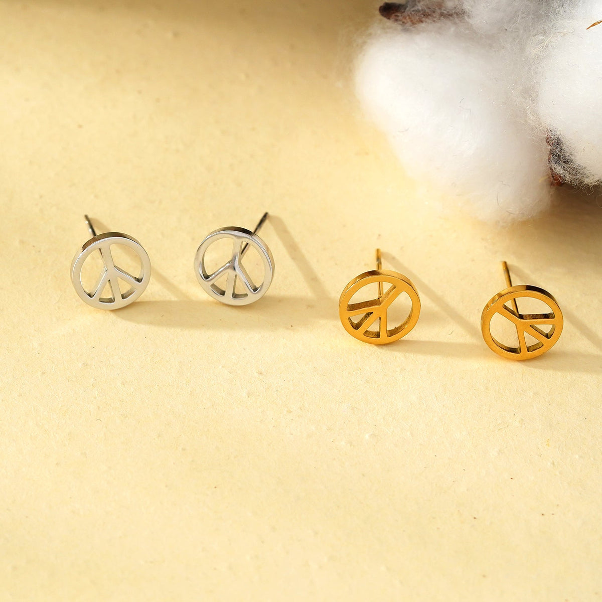 PEACE Logo Stud Earrings in Silver Tone (White Gold)