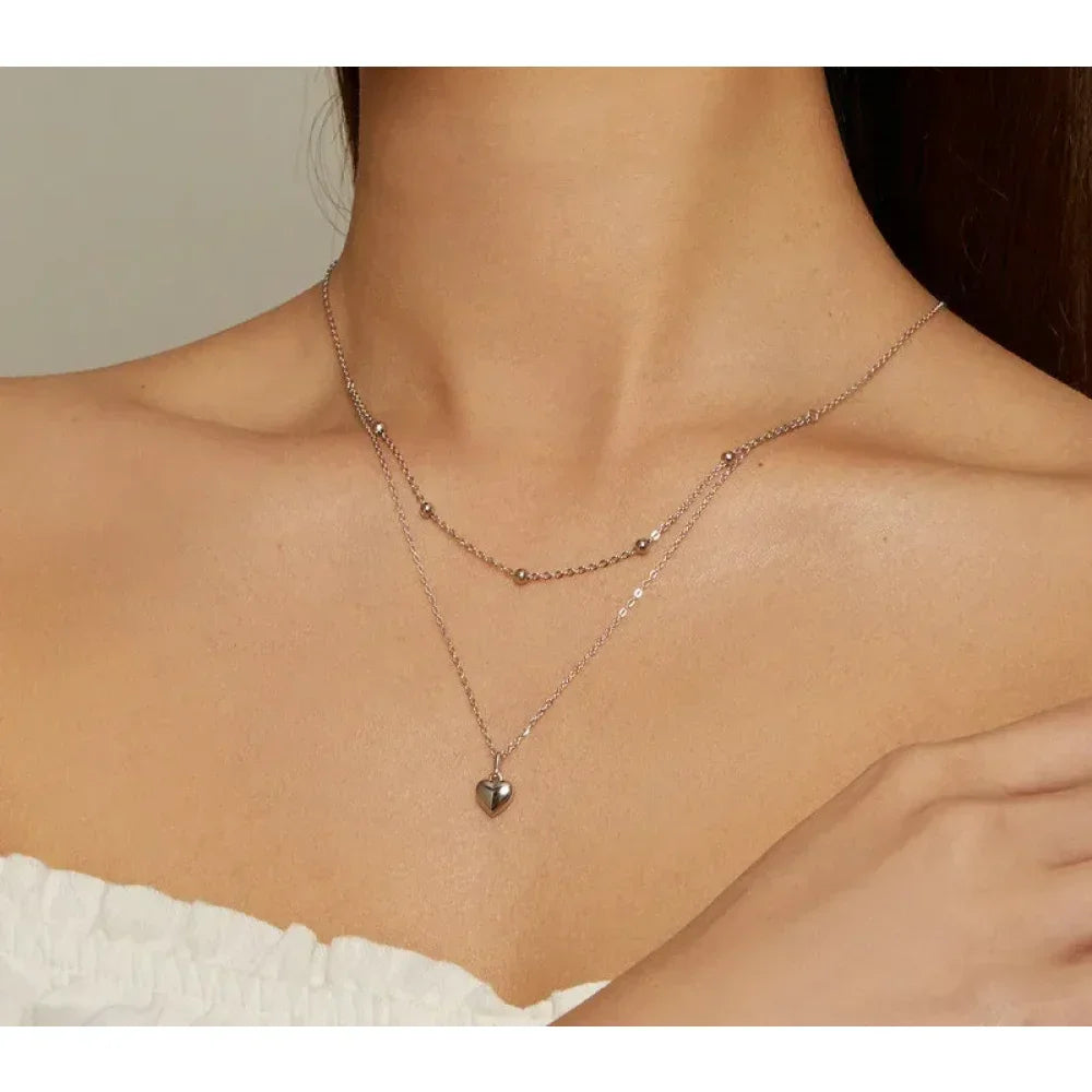 Collier ras de cou avec pendentif double cœur en argent sterling 925