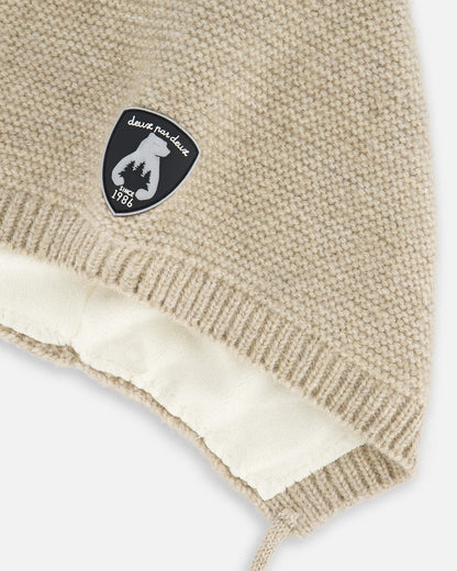 Bonnet pointu en tricot beige pour bébé