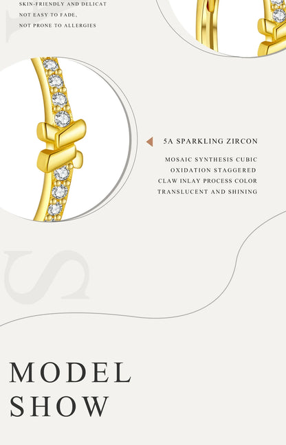 Boucles d'oreilles créoles en argent sterling avec nœud
