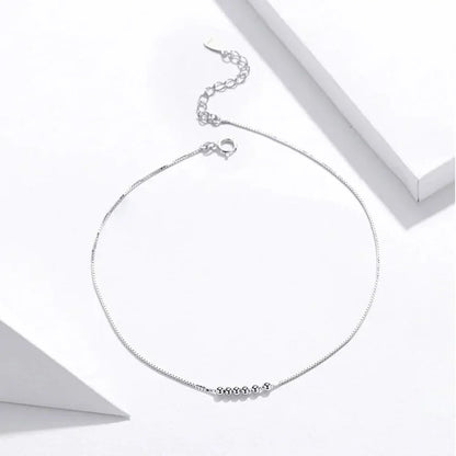 La chevillère à breloques essentielle en argent sterling 925