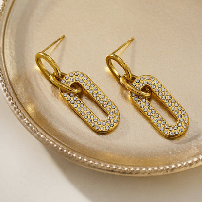 LAIA : Boucles d'oreilles de forme rectangulaire arrondie serties de pierres de zircone