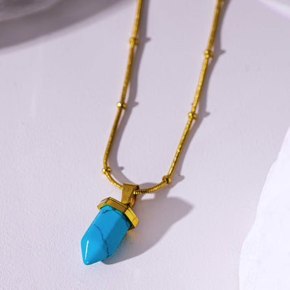 PIPPA : Collier en pierre turquoise africaine, pendentif monté sur une chaîne perlée texturée peau de serpent