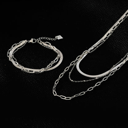 REINEDA: Bracelet triple en or blanc (ton argenté)