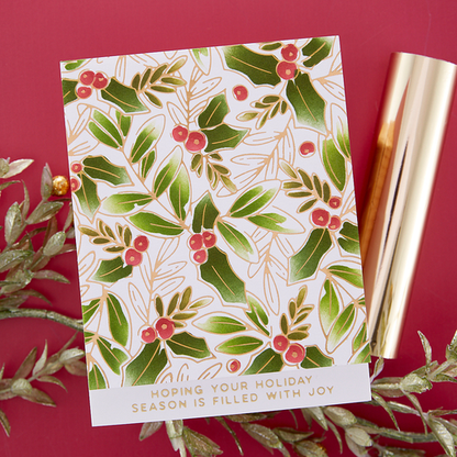 Plaque de fond Glimmer Holly à estampage à chaud de la collection De-Light-Ful Christmas par Yana Smakula
