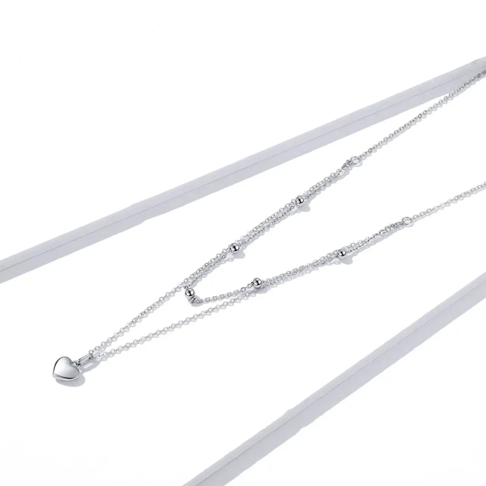 Collier ras de cou avec pendentif double cœur en argent sterling 925