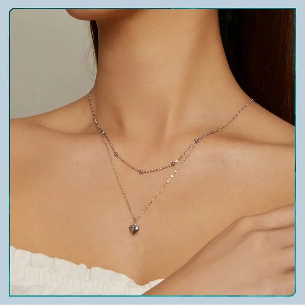 Collier ras de cou avec pendentif double cœur en argent sterling 925