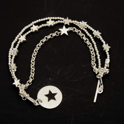 Bracelet multi-rangs en plaqué argent avec pendentif étoile et fermoir en T