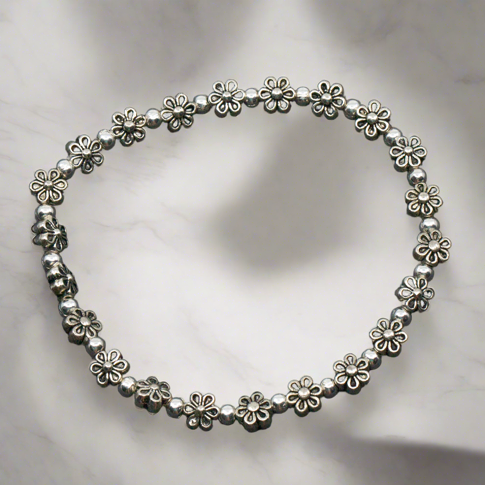 Elasticated Flower Bracelet In Silver Plate