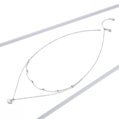 Collier ras de cou avec pendentif double cœur en argent sterling 925